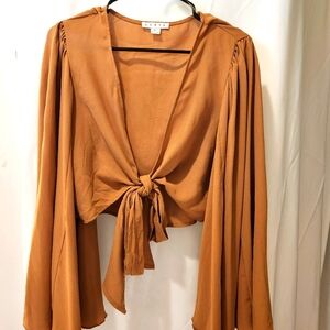 Tie front blouse or topper.